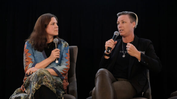 Diana Amini and Abby Wambach on stage at United Nations